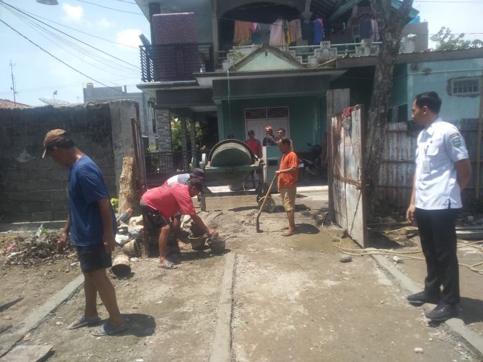 PELAKSANAAN KEGIATAN PENGECORAN BANTUAN HIBAH SEMEN 02